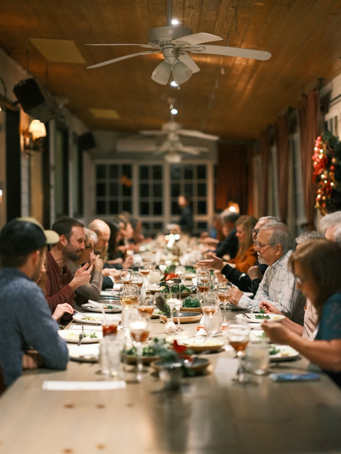 A long dinner table full of people